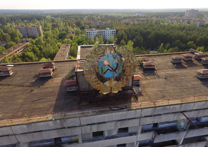 ERecent photo of an abandoned building in Pripyat still adorned with rundown symbols of the USSR. from history.com