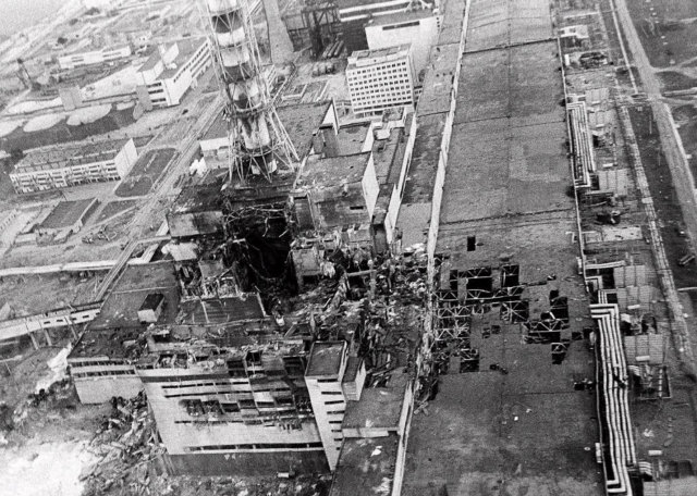 A photograph of a blown-up building that housed reactor No.4 in Chernobyl.
