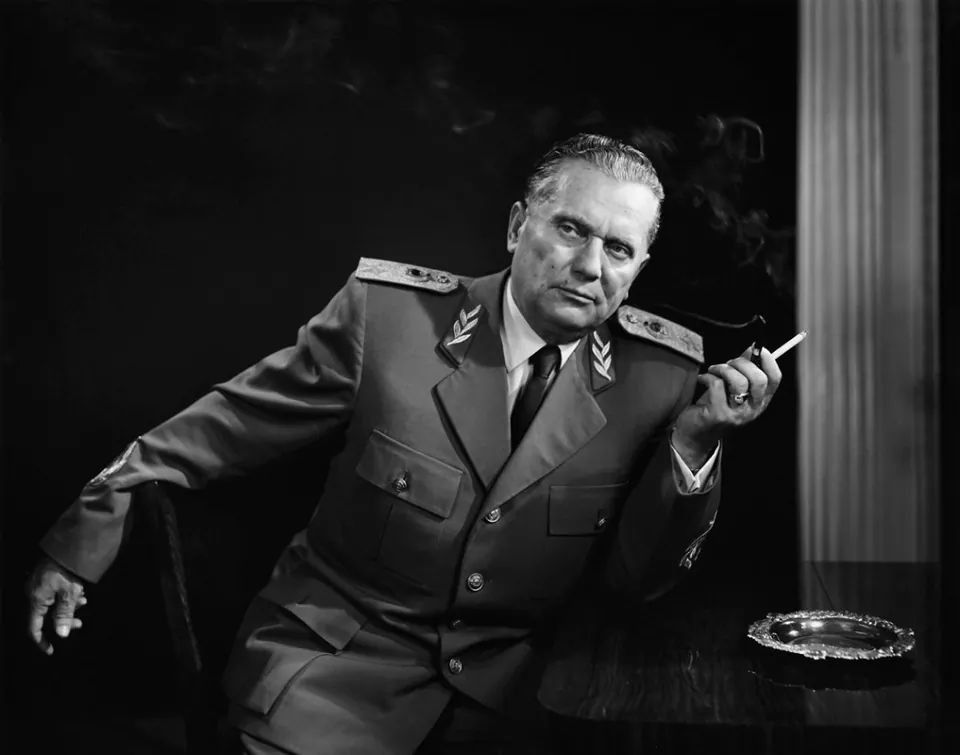 A later photograph of Tito, posing with a cigar in his military uniform.